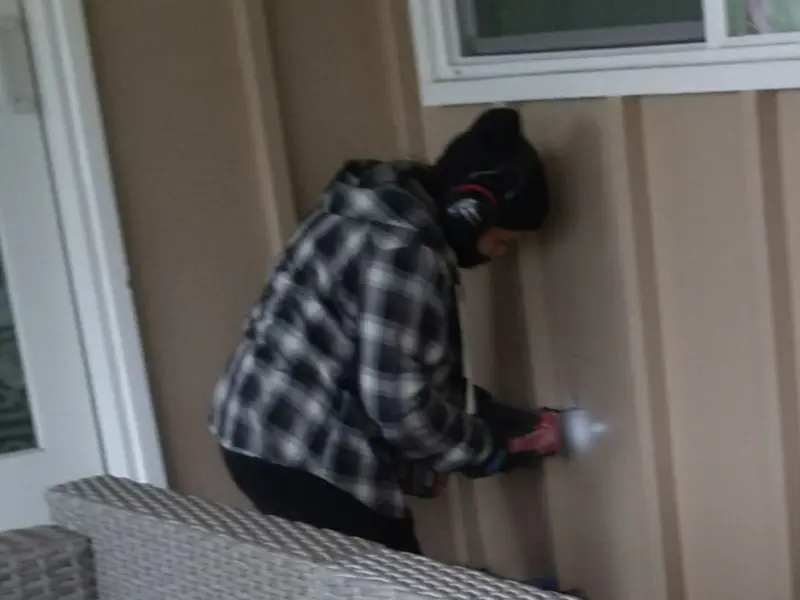 Professional electrician installing an exterior outlet in Sturgis