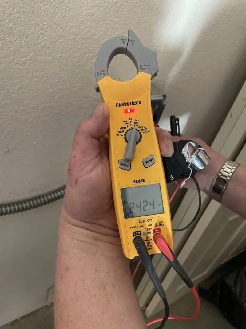 Voltage testing with clamp meter during Generator Installation in Sturgis